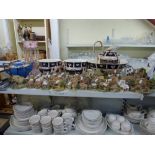 A quantity of Lilliput Lane cottages approximately 48 in total and a blue Gaudy teapot. [s17] TO BID
