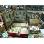 Cigarette cards including two old albums with contents and two tins of cards. TO BID ON THIS LOT AND