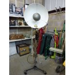 A mid 20th century industrial floodlight by Malham on tripod and adjustable base. [garage] TO BID ON