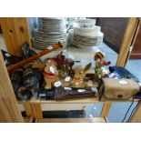 A mixed lot including a pair of vintage ice-skates, a vintage wooden bat, small glass animal