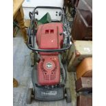 A Mountfield RV40 150 cc Petrol Lawnmower. TO BID ON THIS LOT AND FOR VIEWING APPOINTMENTS CONTACT