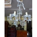 A vintage cut glass drop crystal six-branch chandelier [room] TO BID ON THIS LOT AND FOR VIEWING