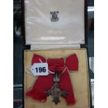 An MBE on lady's bow, in Royal Mint case of issue TO BID ON THIS LOT AND FOR VIEWING APPOINTMENTS