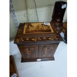 A fine Victorian Tunbridge ware cabinet, the lid decorated with Tonbridge Castle, revealing a purple