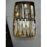 A fine set of six Victorian silver and crested mother of pearl fruit eaters for six, with engraved