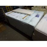 A Silentnight Miracoil Supreme double bed and base covered in blue with cream fabric head. TO BID ON