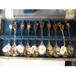 A set of 10 silver and enamel spoons with Queen's Beast terminals, London 1977, 15.6 ozt, in