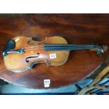 A 19th century violin stamped Viullame Paris on the back with label inside with a two piece back [
