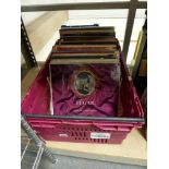 A crate of assorted mainly 12 in records, including classical, movie themes and soundtracks, etc. [