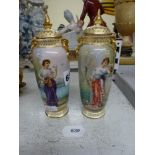 A charming pair of small covered vases by Carl Thieme, each painted by Fritsch, signed, with a