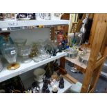A collection of glassware including decanters and stoppers, vases, Murano glass clown, decanter