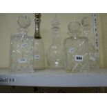 Five glass decanters and stoppers one with silver plated collar and stopper [s80] TO BID ON THIS LOT