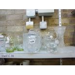 A small quantity of glassware including fruit bowls, vases, jugs, biscuit barrel with silver-