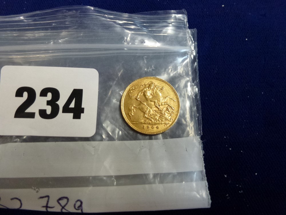 An Edwardian gold half-sovereign coin, 1904 TO BID ON THIS LOT AND FOR VIEWING APPOINTMENTS - Image 2 of 2