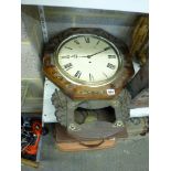 Two clocks in need of repair comprising of a Regency drop-dial wall clock with brass inlay and an