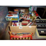 A box of die cast model vehicles including Dinky, Matchbox 100 Years, old Dinky Model kits, Britains