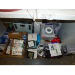 Five boxes of general household goods including alarm clocks, Salter scales, light bulbs,