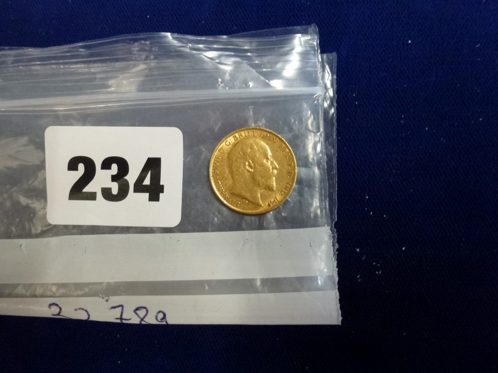 An Edwardian gold half-sovereign coin, 1904 TO BID ON THIS LOT AND FOR VIEWING APPOINTMENTS