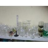 Two shelves of m ixed glassware including Dartington, whisky tumblers, tankards, decanters and