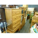 A group of stylish 1960s furniture comprising a light oak chest of four drawers with original