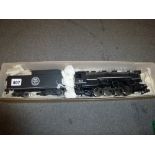 Trains: an '0' gauge Rivarossi locomotive and tender, Chicago Railroads [upstairs shelves] TO BID ON