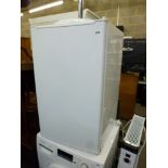 A small under work-top fridge with ice compartment. TO BID ON THIS LOT AND FOR VIEWING