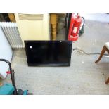 A Panasonic Viera flat screen television with wall mounting accessories. [opposite G37] TO BID ON