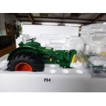 A Franklin Mint 1:12 scale model of an Oliver tractor, in original packaging [upstairs shelves] TO