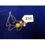 A pair of 18 ct gold ear clips, each set with a mabe pearl, London 1990, 3.9 gm; a chain necklet,