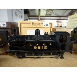 Trains: an '0' gauge electric model locomotive, LNER 0-6-2T, possibly by Leeds [upstairs shelves] TO