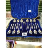 A good cased set of 12 silver teaspoons and sugar tongs, initialled M, Sheffield 1901/1902, 5.7