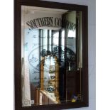 A 'Southern Comfort' advertising rectangular wall mirror within a dark wood frame (88 x 62.5 cm),