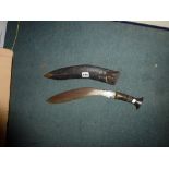A vintage kukri, the blade stamped A.B. Thakur & Sons..., with scabbard [B] TO BID ON THIS LOT AND