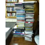 A quantity of DVDs and CDs including Industrial Revelations, The King's Speech, mainly classical