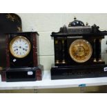 A large late 19th century ornate slate mantel clock, the Ansonia movement with visible escapement;
