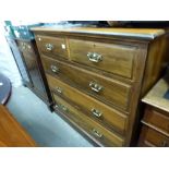 A good quality chest of two short over three long drawers with heavy brass drop handles raised on
