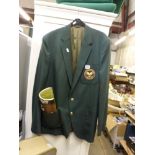 A Wimbledon Championship's green blazer and a Wimbledon 1980 Final's programme. [end 2nd aisle] TO