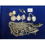 Eight old watch chains in silver and other metal and silver chain medallions including one to R