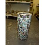 A modern Oriental cylindrical porcelain stick stand, with traditional figural and floral