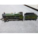 Trains: an '0' gauge Basset Lowke electric locomotive and tender, GWR [upstairs shelves] TO BID ON
