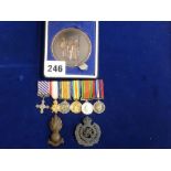 A miniature group of medals mounted for wearing, comprising DFC, 1914-15 Star, War medal, Victory