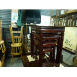 A good quality set of Eastern hardwood nesting tables of four graduated sizes. WE DO NOT TAKE CREDIT