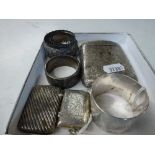 Six items of decorative silver smallwork, late Victorian to Edwardian, comprising: a napkin ring