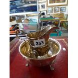 A fine Irish silver reproduction milk jug and sugar basin with punched dot decoration and on lion-