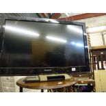 A Panasonic Viera flat screen television with remote [end of second aisle] WE DO NOT TAKE CREDIT