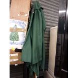 A large green umbrella on wooden base plus a boxed Delux Imperial Pine artificial Christmas tree [