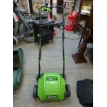 A Tooltronix electric lawnmower [back doors] WE DO NOT TAKE CREDIT CARDS OR CASH. STORAGE IS CHARGED