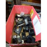 A box of old mobile phones including a Motorola C113A, a Sony Ericsson, a Motorola E398 plus a large