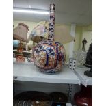 A very large Japanese Imari porcelain bottle vase, circa 1900, 23.5 in high [R] WE DO NOT TAKE