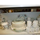 A shelf of mixed tea services including Colclough, Royal Crown Derby and Thomas, plus 12 Royal